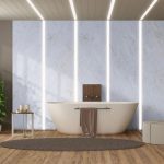 Modern home bathroom with bathtub against wooden paneling